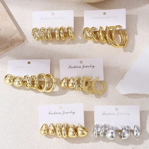 Chic gold and silver CCB hoop earring sets with twisted designs on display card