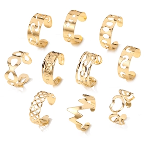 Detailed set of 10 golden hollow ear cuffs featuring star moon and geometric shapes