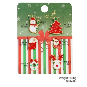 Set of 6 Christmas brooches with snowman and deer icons on decorative card