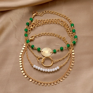 4-piece punk gold alloy cuban bracelet set with green beads and round charms on silk