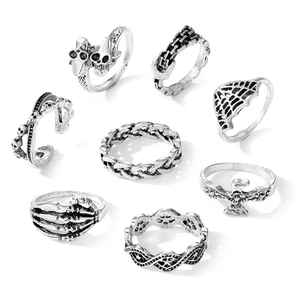 8-piece set of gothic punk rings featuring skull, spider web and eagle motifs in vintage finish