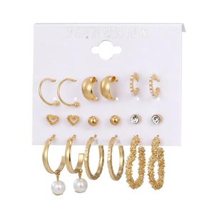 9-pair vintage gold earring set with pearls, heart studs, and textured hoops for women