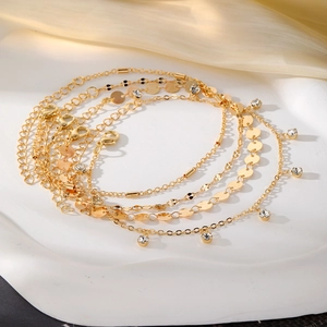 Gouden gelaagde enkelbandset met ster vlinderhangers en zirkonia cubaanse schakelketting