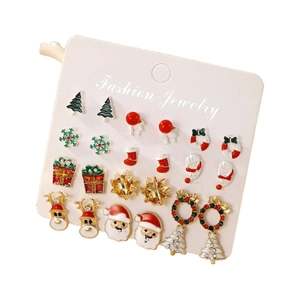Weihnachts-Ohrstecker Set mit Rentier, Schneeflocken und Festbäumen auf Karte