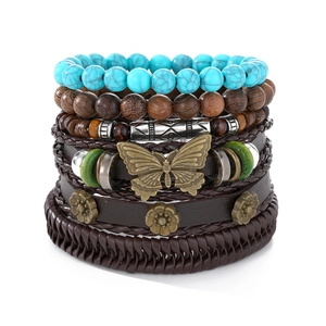 Handmade bohemian stackable bracelet set with turquoise beads and butterfly charm
