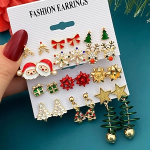 Christmas earring set with 12 pairs of festive Santa, reindeer, and snowflake studs