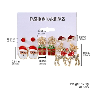 Detailed view of Christmas earring set with dimensions and weights on white background