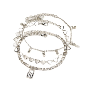 Silver layered anklet set with padlock, heart charms, and small bells for women