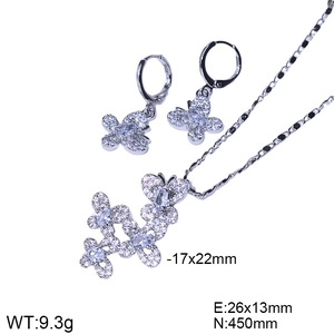 Detail showing butterfly jewelry set dimensions and weight with clear metal texture