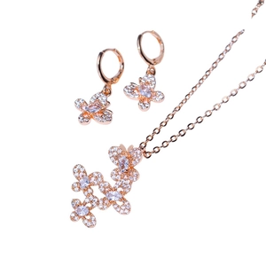 Rose gold butterfly jewelry set with zircon necklace and matching hook earrings