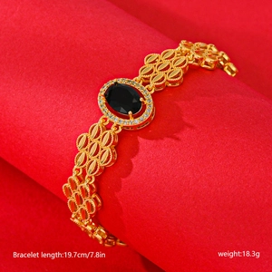 Elegant gold-plated flower design bracelet with oval black stone and white cubic zirconia
