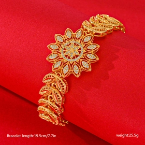 Exquisite gold plated sunburst bracelet with zircon accents and hollow floral pattern