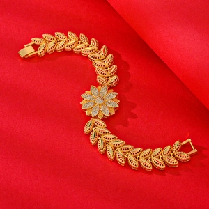 Exquisite gold plated flower and leaf link bracelet with shimmering zircon stones
