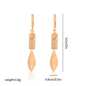 Gold-plated drop earrings with zircon inlays and leaf-shaped metal pendants
