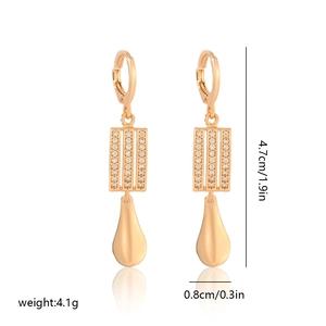 Detail view of gold-plated drop earrings with cubic zirconia and dimension labels