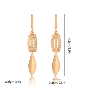 Detail view of gold-plated leaf earrings with zircon inlay showing 4.9cm height dimensions