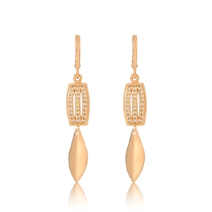 Detail of rose gold leverback earrings with leaf pendant and sparkling zircon accents