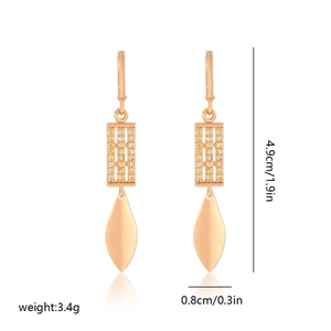 Detailed view of gold plated earrings featuring cubic zirconia and dimensions of 4.9cm by 0.8cm