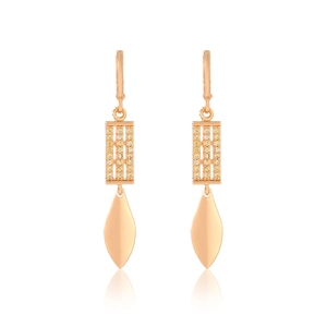 Macro detail of rose gold lever-back earrings with pavé crystals and leaf-shaped pendants