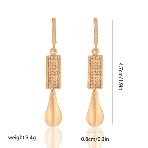 Detail showing weight 3.4g and dimensions 4.7cm x 0.8cm for gold-plated drop earrings