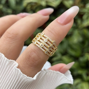 Detailed view of layered 18K gold plated ring with geometric zircon stone inlay