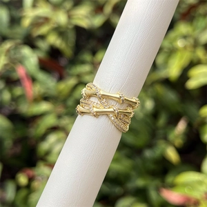 Detailed view of an 18K gold-plated bamboo ring with shimmering cubic zirconia accents