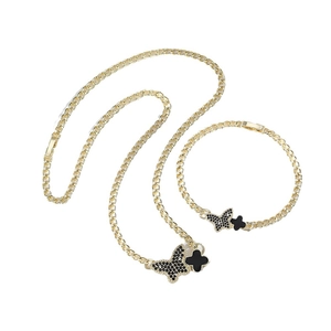 14K gold plated jewelry set with butterfly and clover charms on curb chains