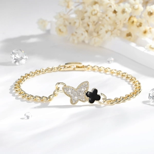 14K gold plated bracelet set featuring zircon butterfly and black clover pendants