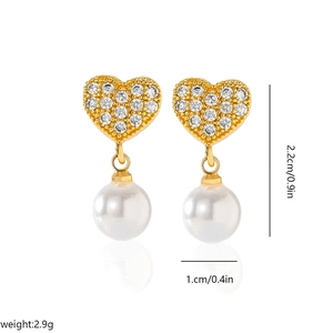 Elegant gold heart earrings with zircon inlay and round white pearls for women