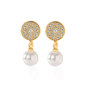 Detailed view of gold plated circular earrings with pavé cubic zirconia and drop pearls