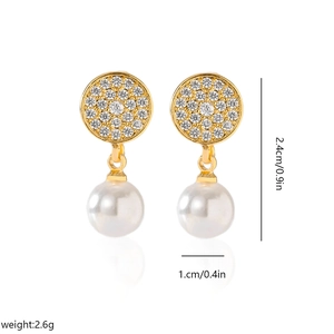 Detail shot of pearl drop earrings with zircon pavé studs showing 2.4cm height