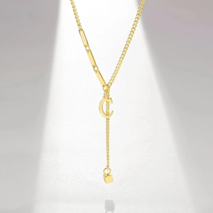 Gold-plated Y-shaped necklace with letter C pendant and tassel cuboid charm