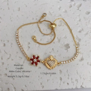 Adjustable 18K gold plated bolo bracelet with red zircon flower and heart charms