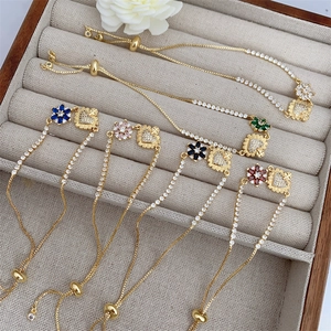 Adjustable 18K gold plated bracelet with colorful zircon flowers and heart charms