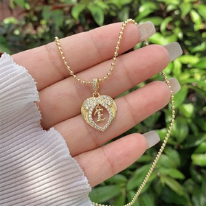 18K gold plated heart pendant with zircon letter E on golden bead necklace