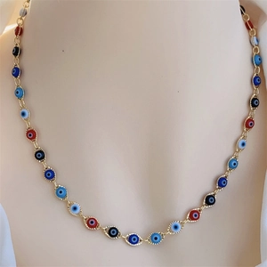 Detail of 18K gold plated chain necklace featuring multicolored enamel evil eye charms