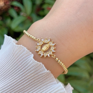 Classic 18K gold plated bead bracelet featuring a Virgin Mary sunburst zircon pendant