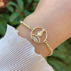Elegant 18K gold-plated beaded bracelet with Virgin Mary and evil eye zircon charm