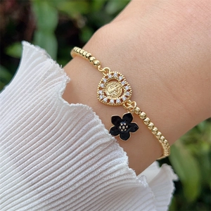 Elegant 18K gold plated beaded bracelet with zircon heart and black flower charms