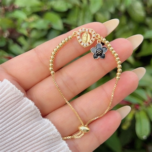 Elegant 18K gold plated bead bracelet with Saint Jude heart charm and floral pendant
