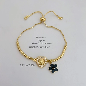 Classic St. Jude gold flower bracelet with zirconia heart pendant and 18K gold plating