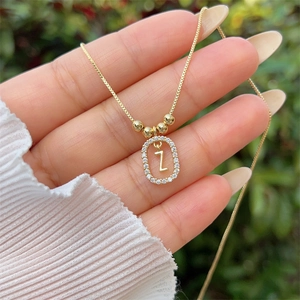 Detailed close-up of 18K gold plated letter Z pendant with sparkling cubic zirconia