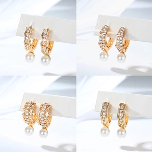 Elegant gold plated pearl earrings with sparkling zircon inlay in four stylish designs