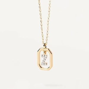 Detail of gold octagon pendant necklace with micro-paved diamond letter Z on a slim chain
