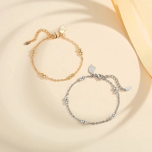 Pulseras de cuentas minimalistas en oro y plata con cierre de mosquetón ajustable