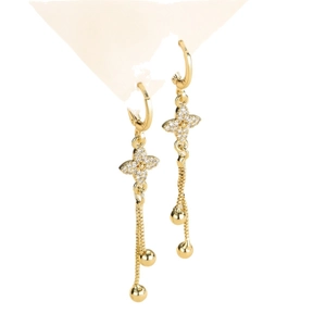 Elegantes pendientes de borla dorados con diseño de trébol de circón y largas cadenas finas