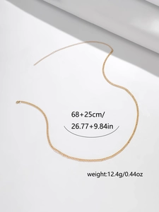 Détail de la chaîne de taille dorée NK avec dimensions 68+25cm et fermoir homard
