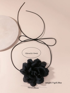 Detail view of 10cm black chiffon flower choker with 135cm adjustable lacing strap