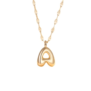 Polished gold bubble letter A pendant necklace with minimalist 3D rounded design on white background