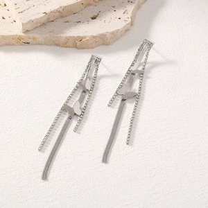 Detailed view of elegant silver butterfly tassel earrings with sparkling rhinestones